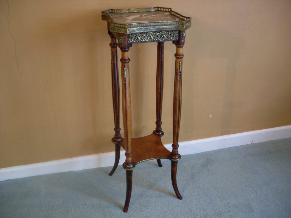 An ornate French 19thC torchere