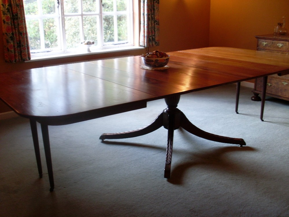 A huge late Victorian extending dining table