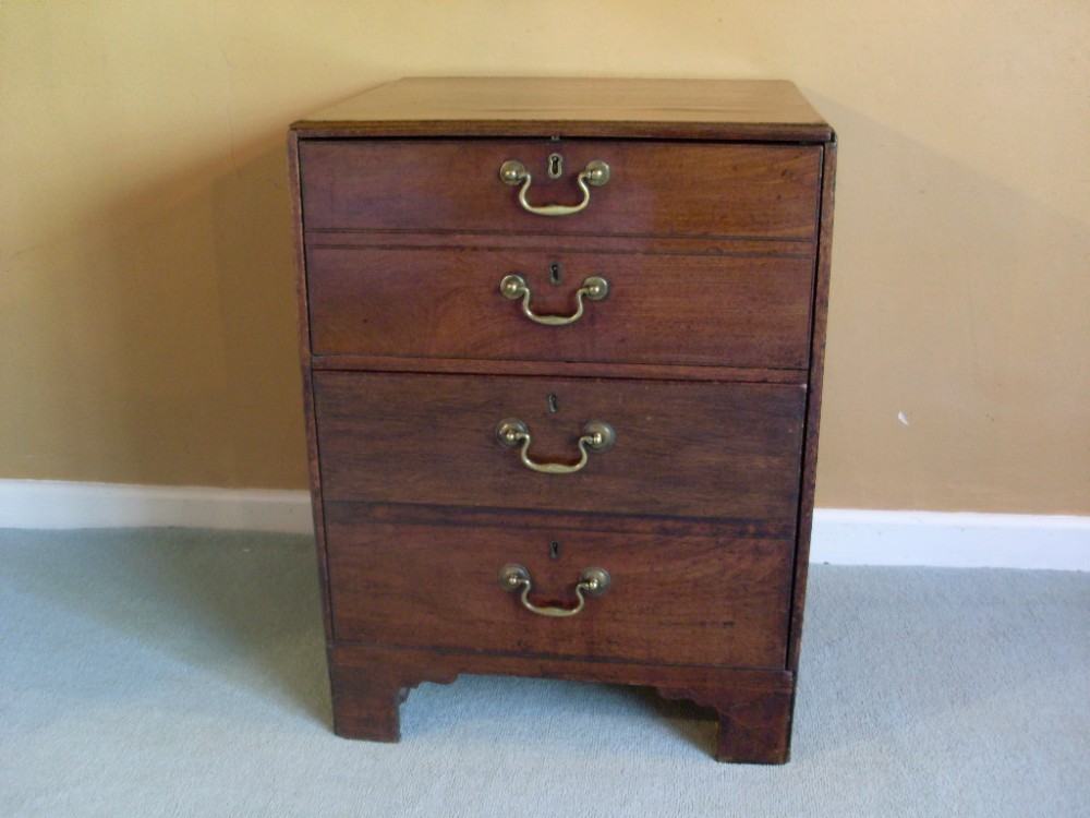 A Georgian faux chest bedside table