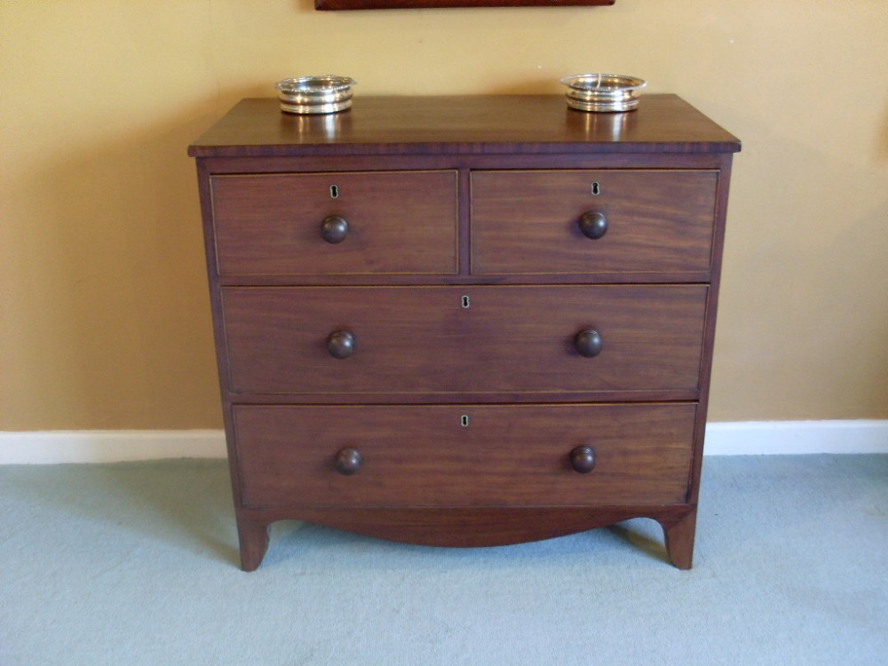 A small late Regency chest of drawers