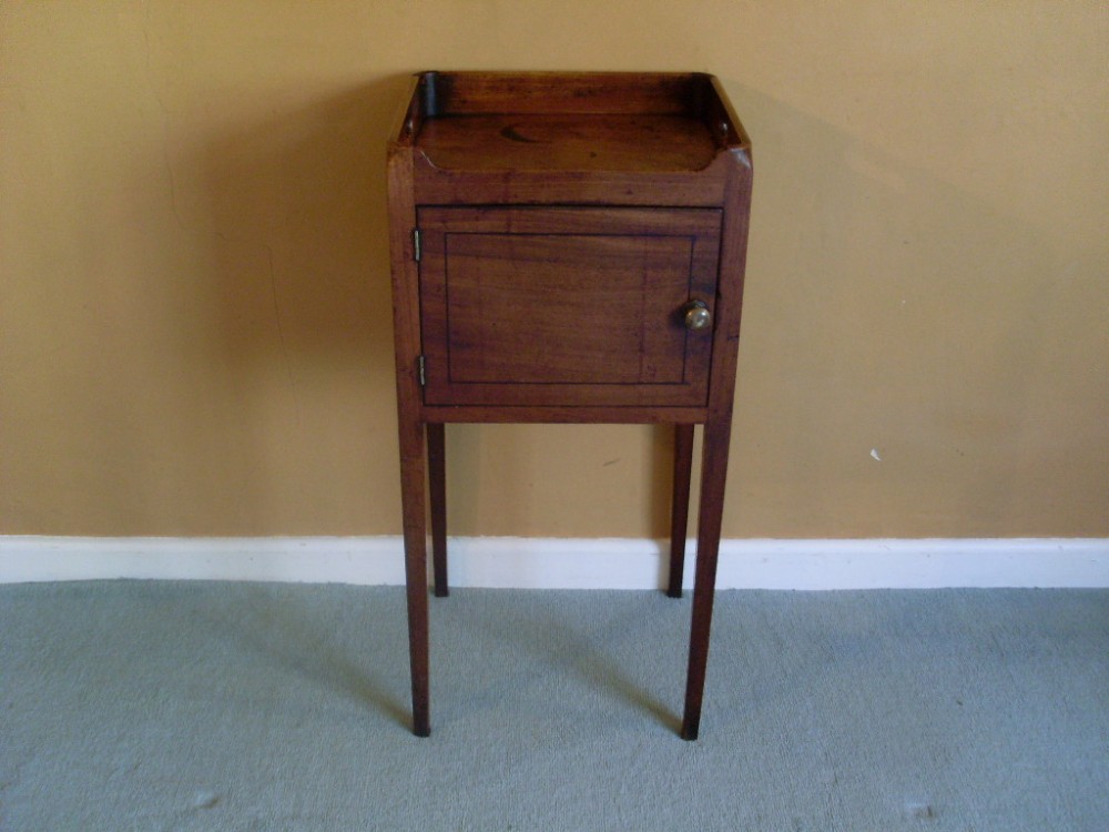 A 19thC mahogany tray top bedside stand