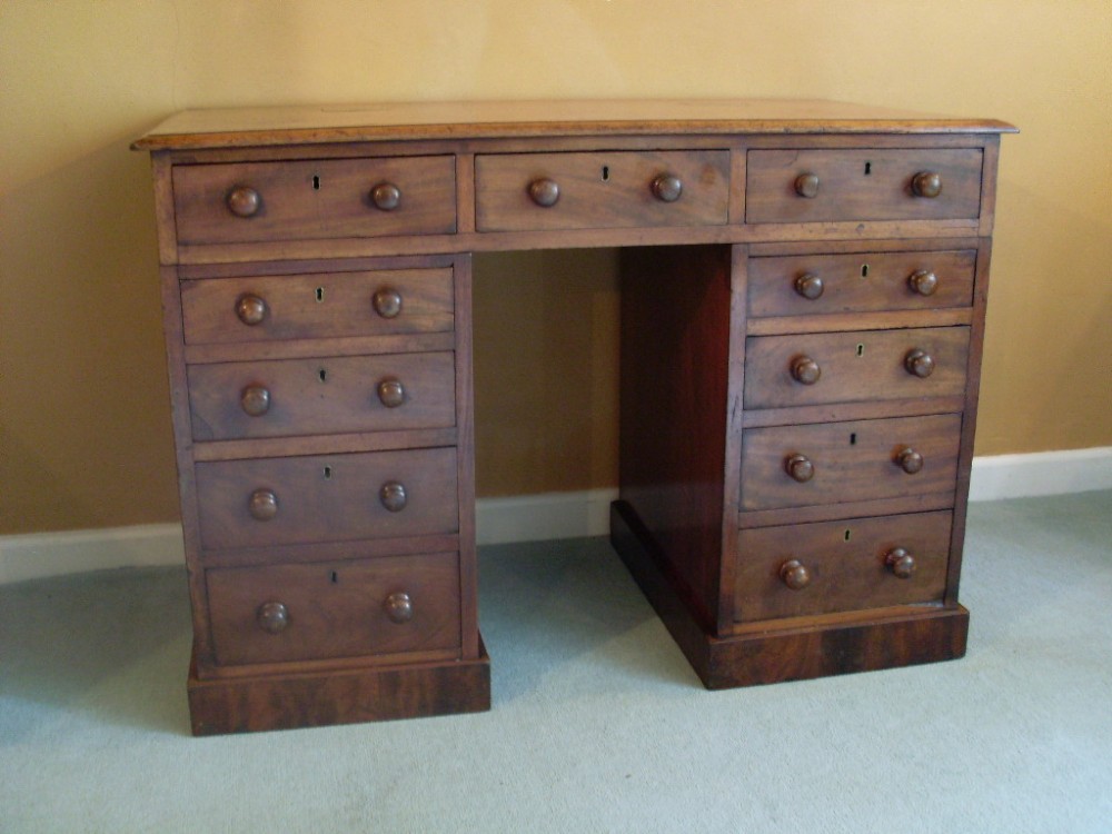 An early Victorian pedestal desk
