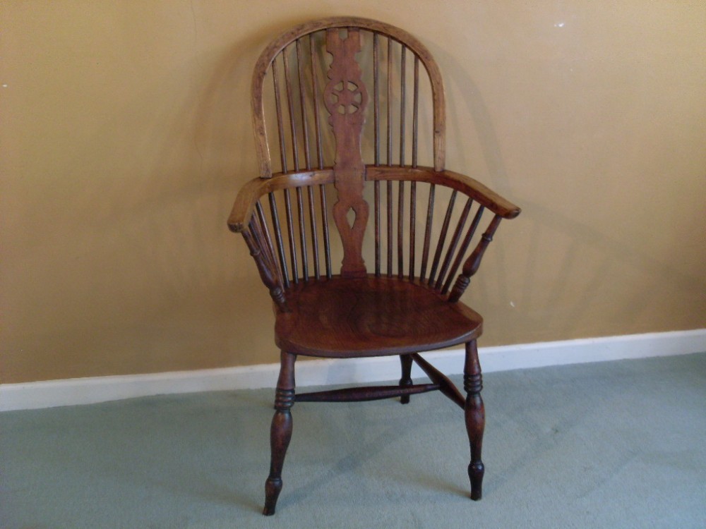 A 19thC Windsor high back arm chair