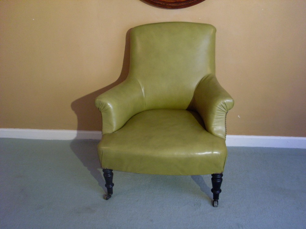 A French leather covered armchair
