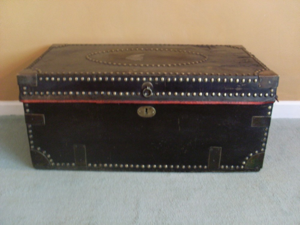 A Regency leather covered campaign trunk