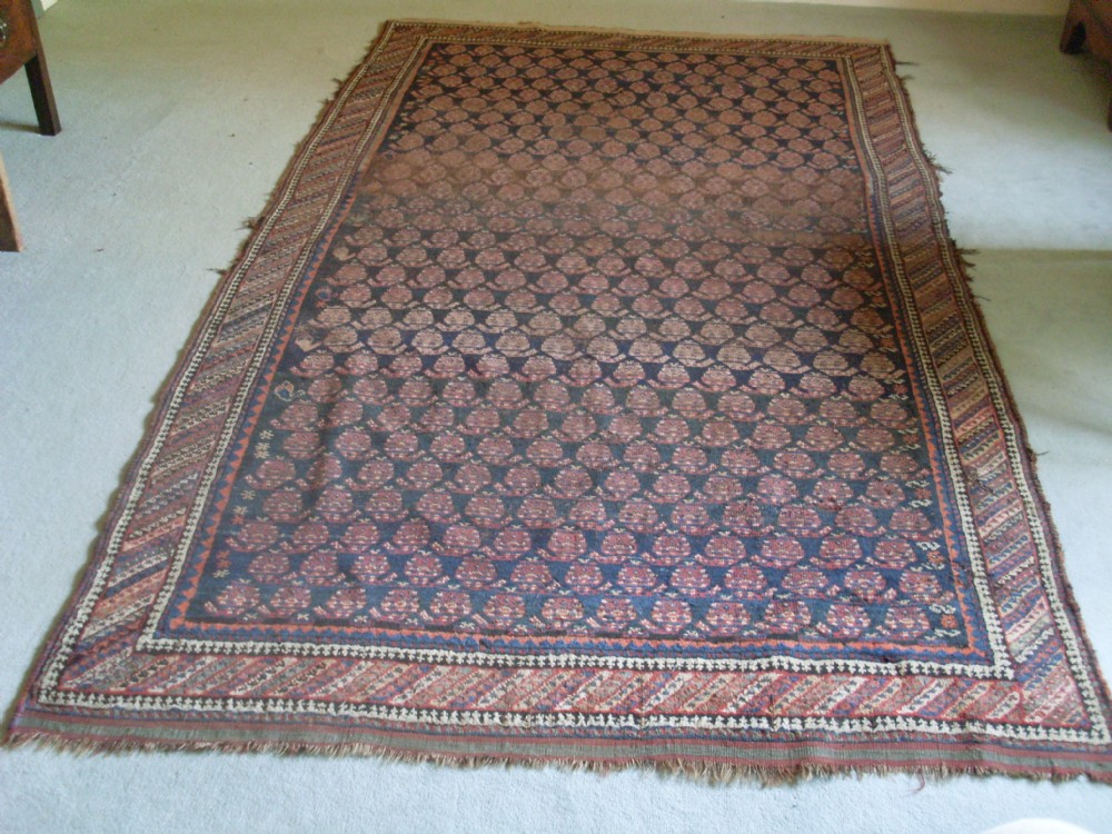 An antique Caucasian rug