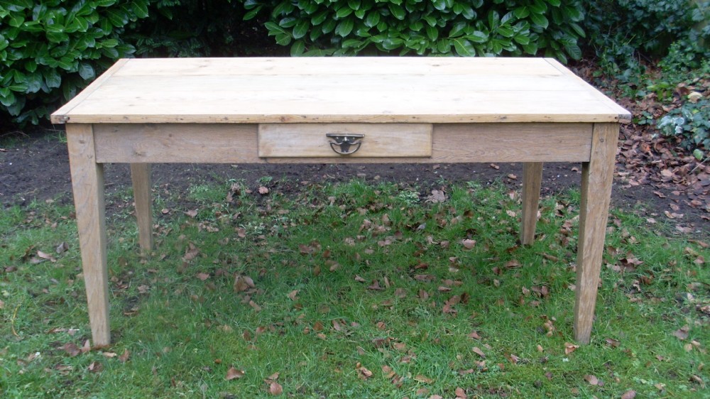 A 19thC bleached top French kitchen table