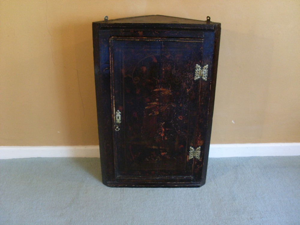 An 18thC chinoiserie corner cupboard