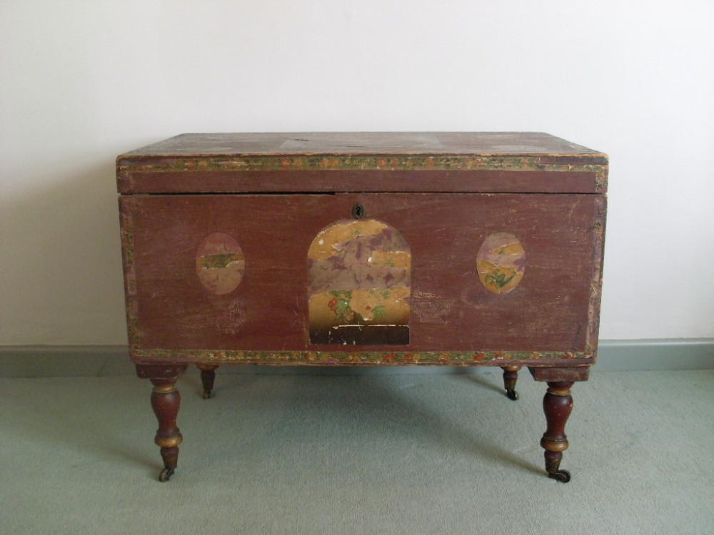 A decorative Georgian painted box on stand