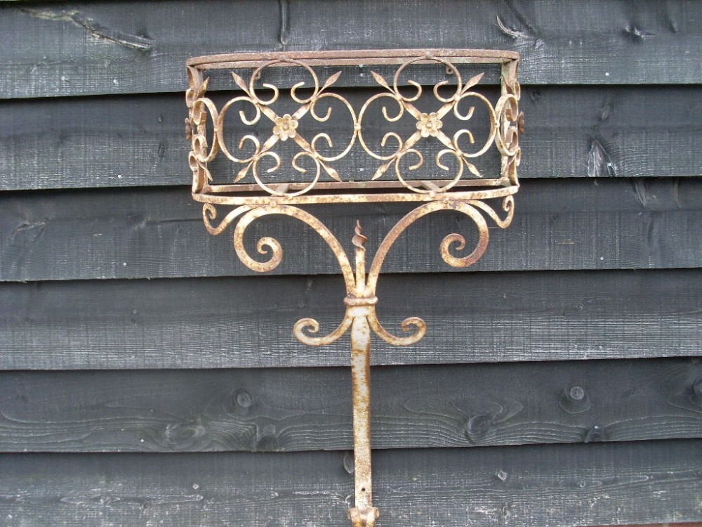 A garden or conservatory plant console table