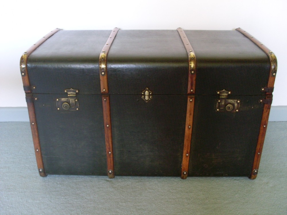 A faux leather covered travelling trunk