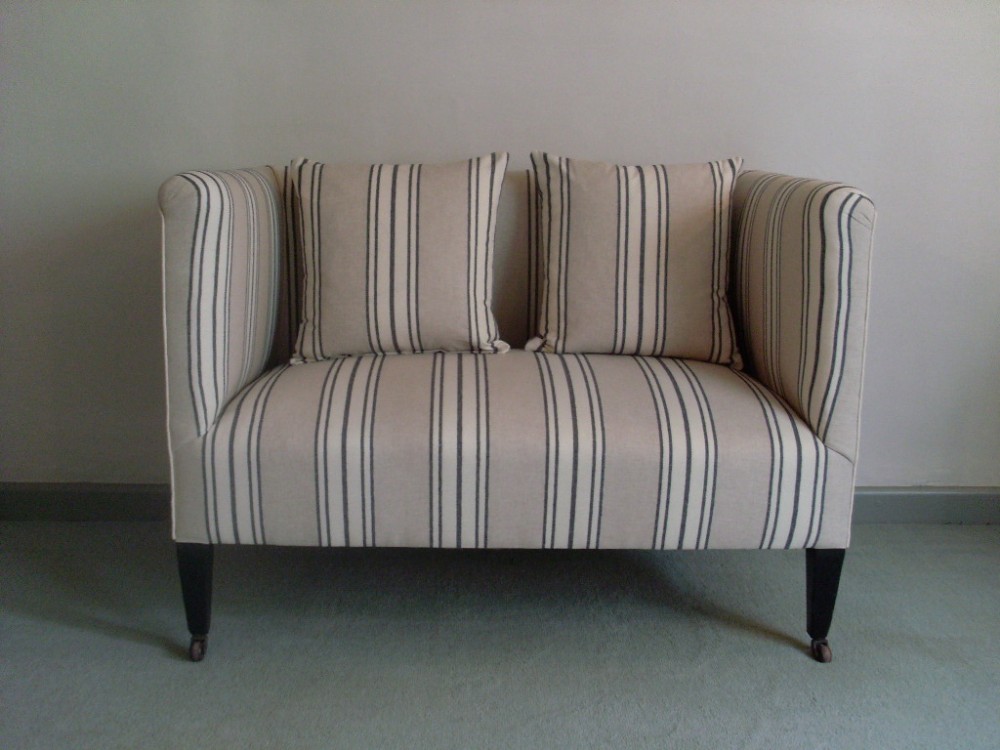 A small Edwardian window seat sofa