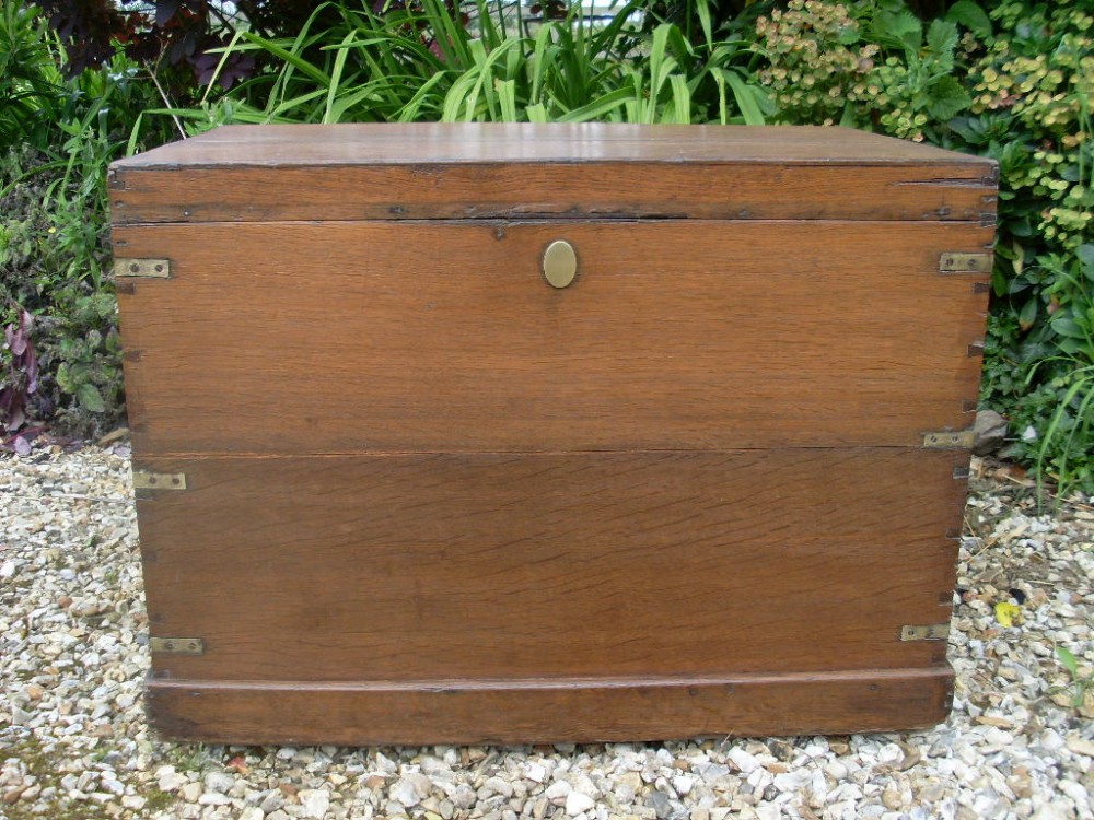 A 19thC oak brass bound trunk coffee table