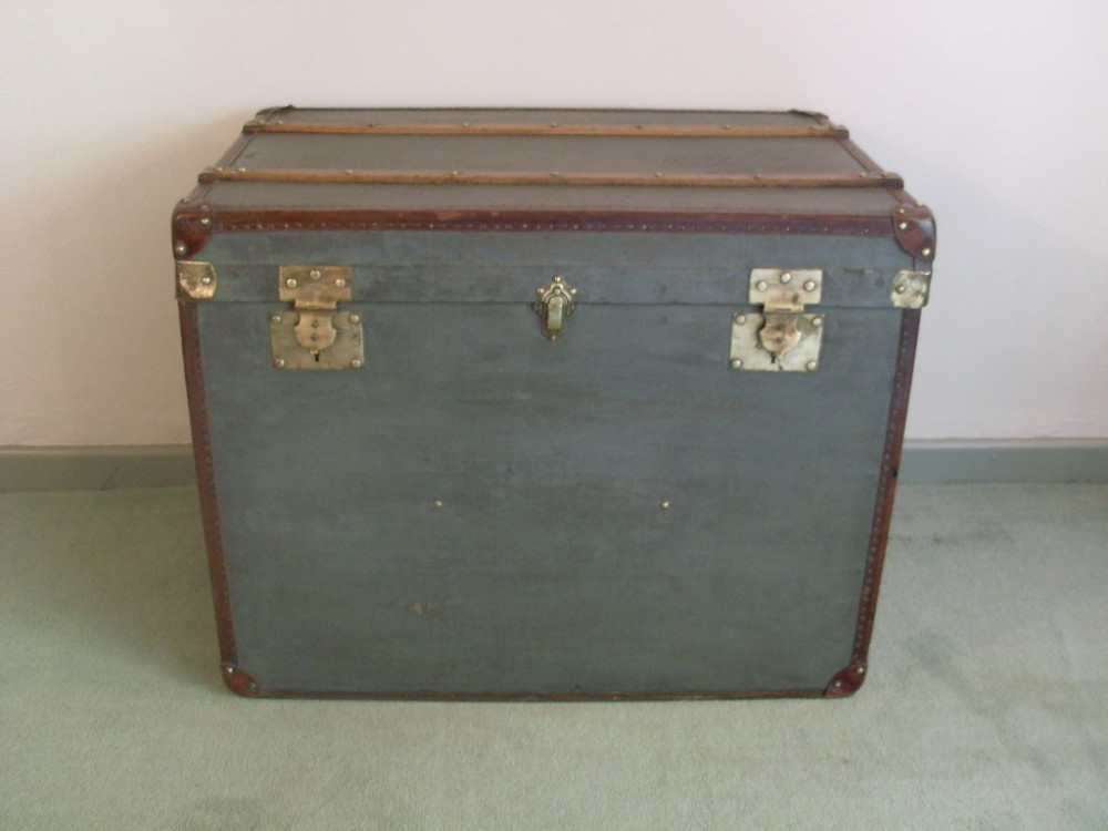 A 19thC French travelling trunk lamp table or coffee table