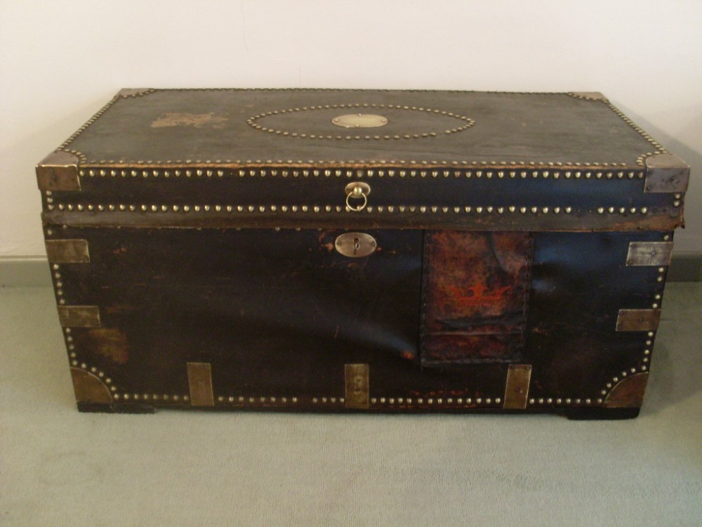 A hide covered 18thC camphor wood trunk