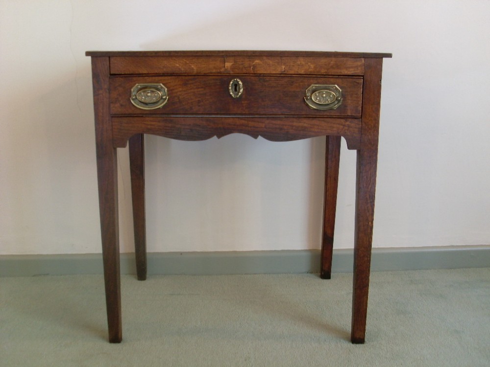 A Georgian oak side table