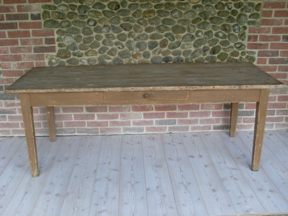 A large pine 19thC French table