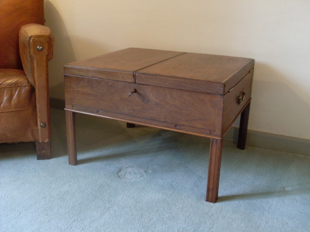 A Georgian fitted box on stand coffee table