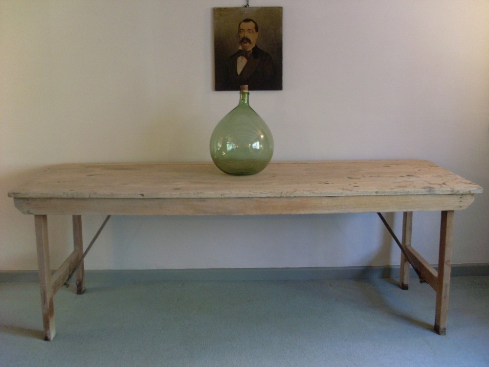 A bleached oak French artists trestle table