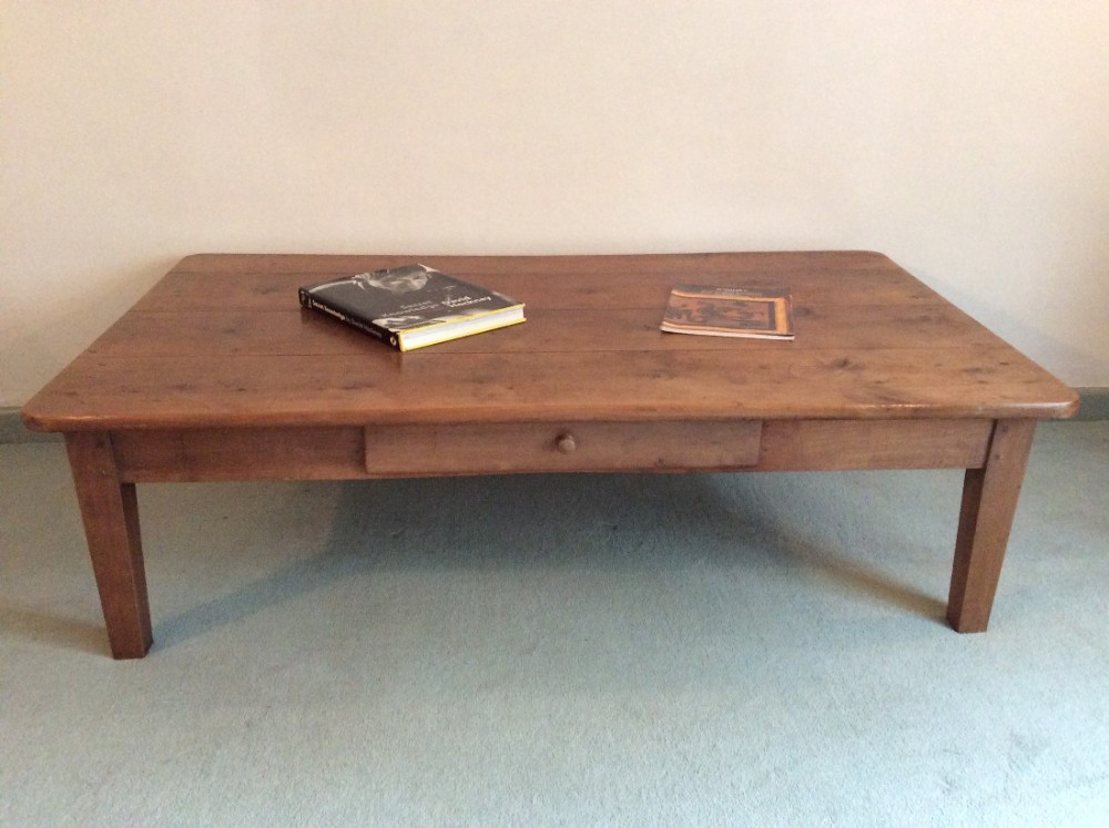 A large19thC cherry coffee table
