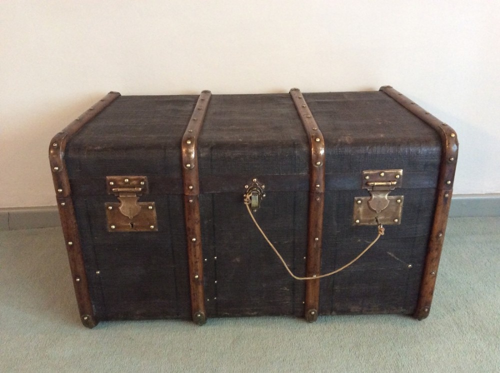 A French studded and battoned trunk
