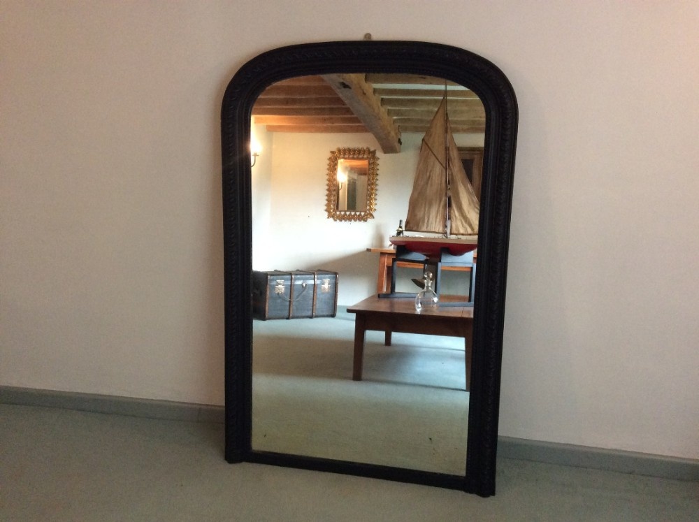 A 19thc arch topped overmantle mirror