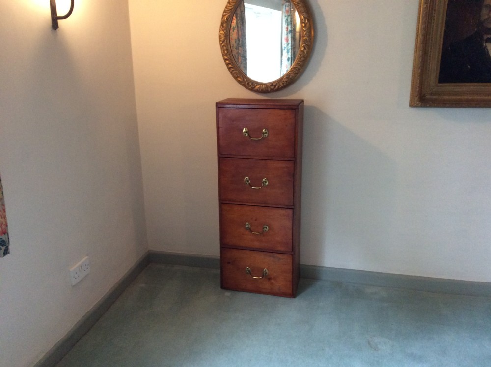 A late 19thC tall bank of drawers. View II