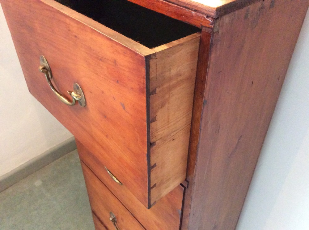 A late 19thC tall bank of drawers. View IV