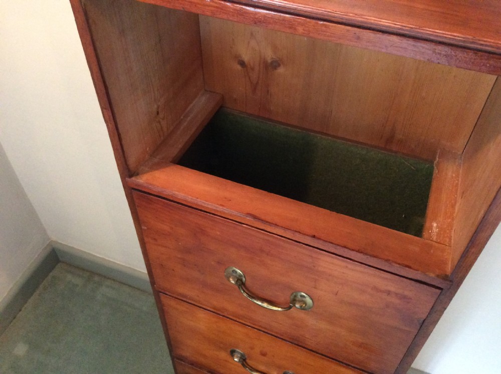A late 19thC tall bank of drawers. View VI
