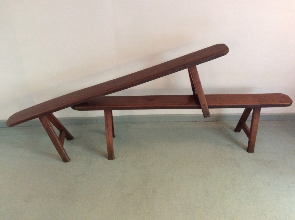 A good pair of French cherry wood benches