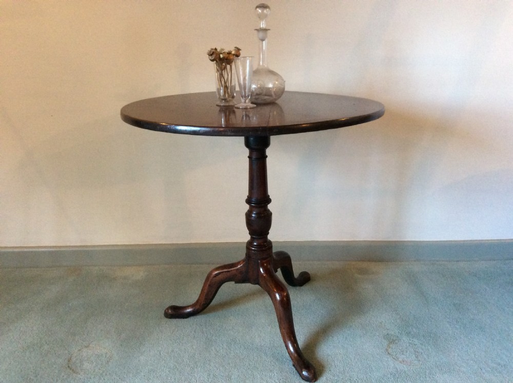A Georgian tilt top tripod table