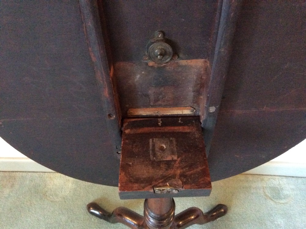 A Georgian tilt top tripod table View IV