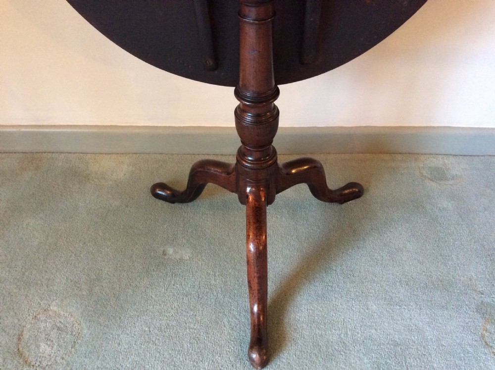 A Georgian tilt top tripod table View V