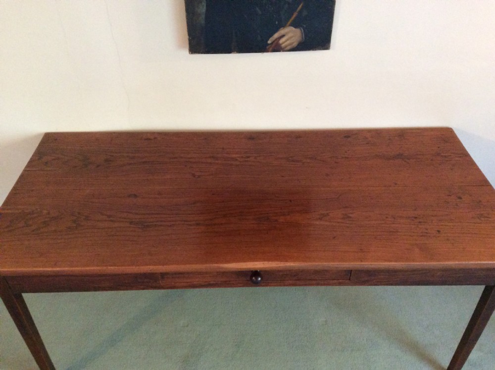 A 19thC French elm farmhouse table seats 8 View V