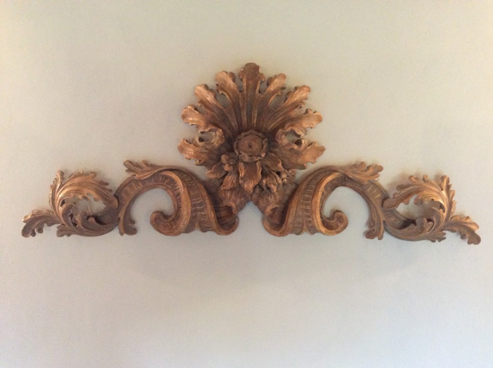 A 19thC carved lime wood portico panel