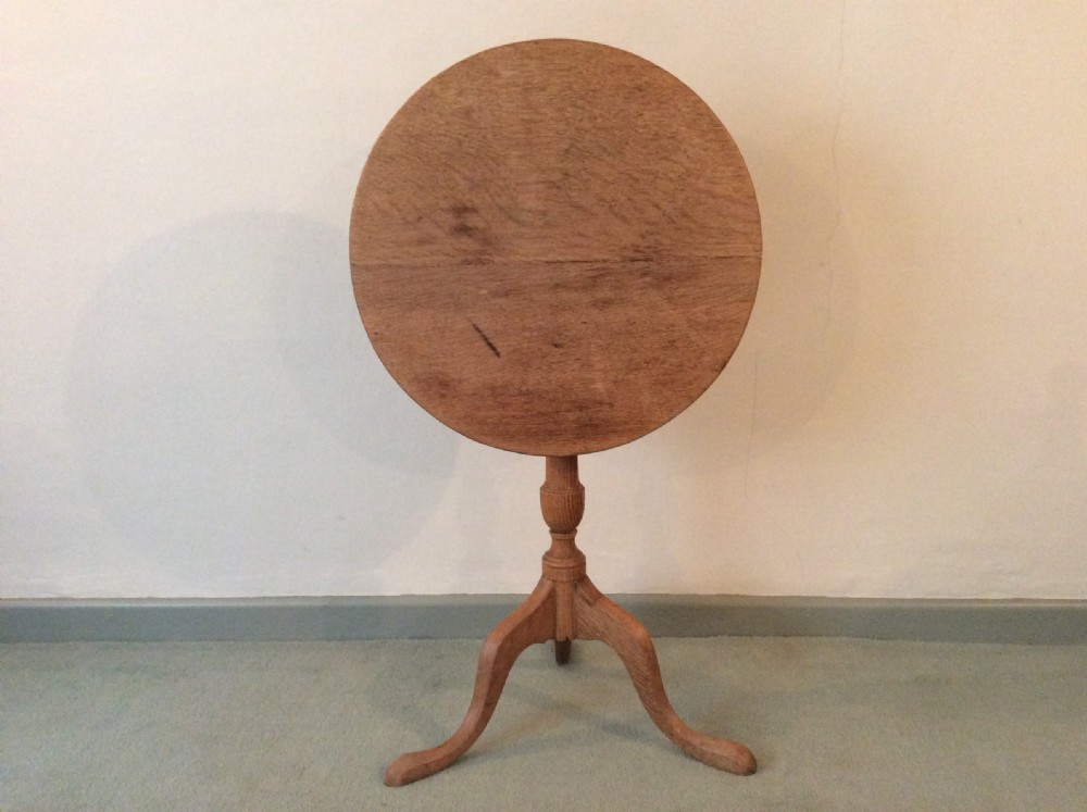 A 54 cm dia bleached oak and elm tripod  table View II