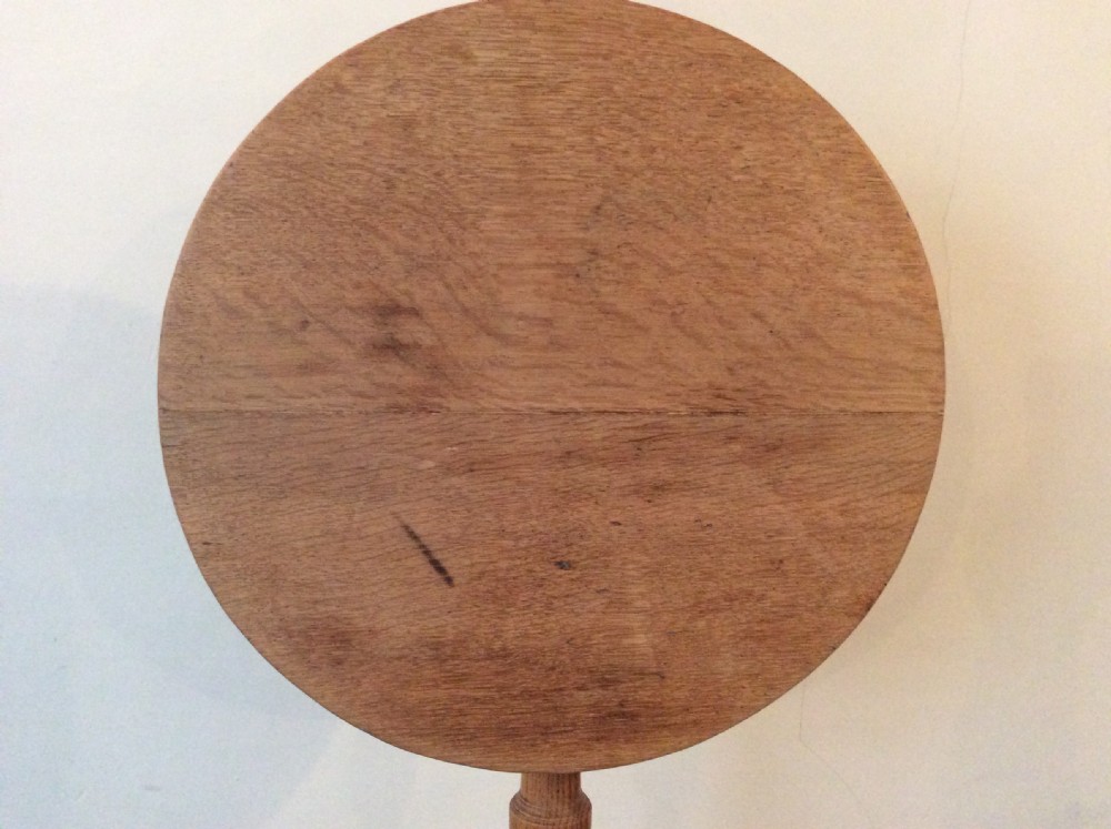 A 54 cm dia bleached oak and elm tripod  table View III