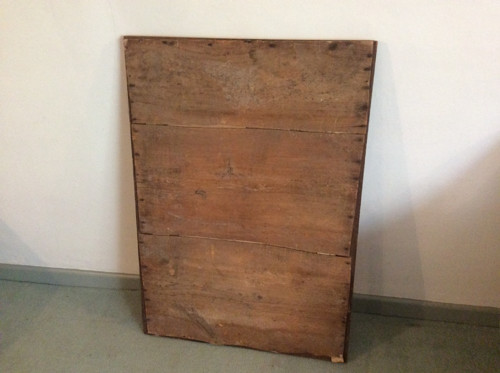A French carved wood framed mirror View V