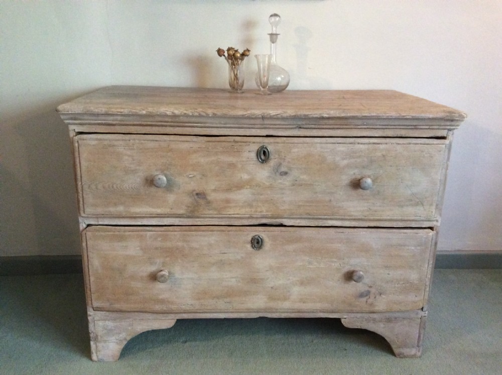 A Georgian two drawer pine chest