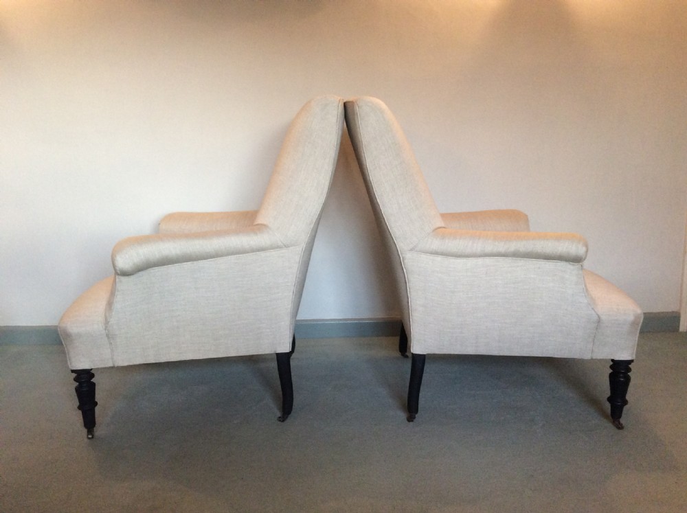 A pair of French upholstered armchairs View II