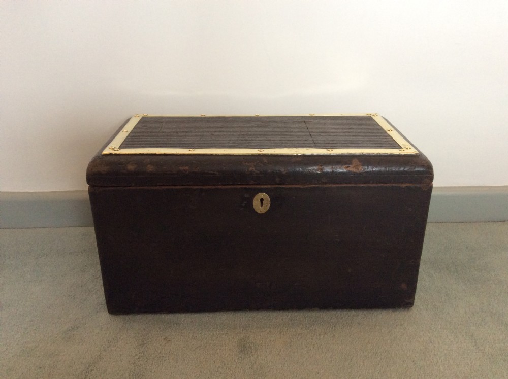 A vintage car or carriage tool box