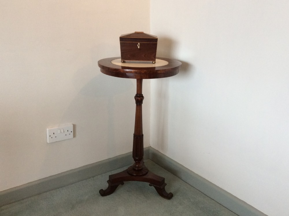A Regency mahogany occasional table View II