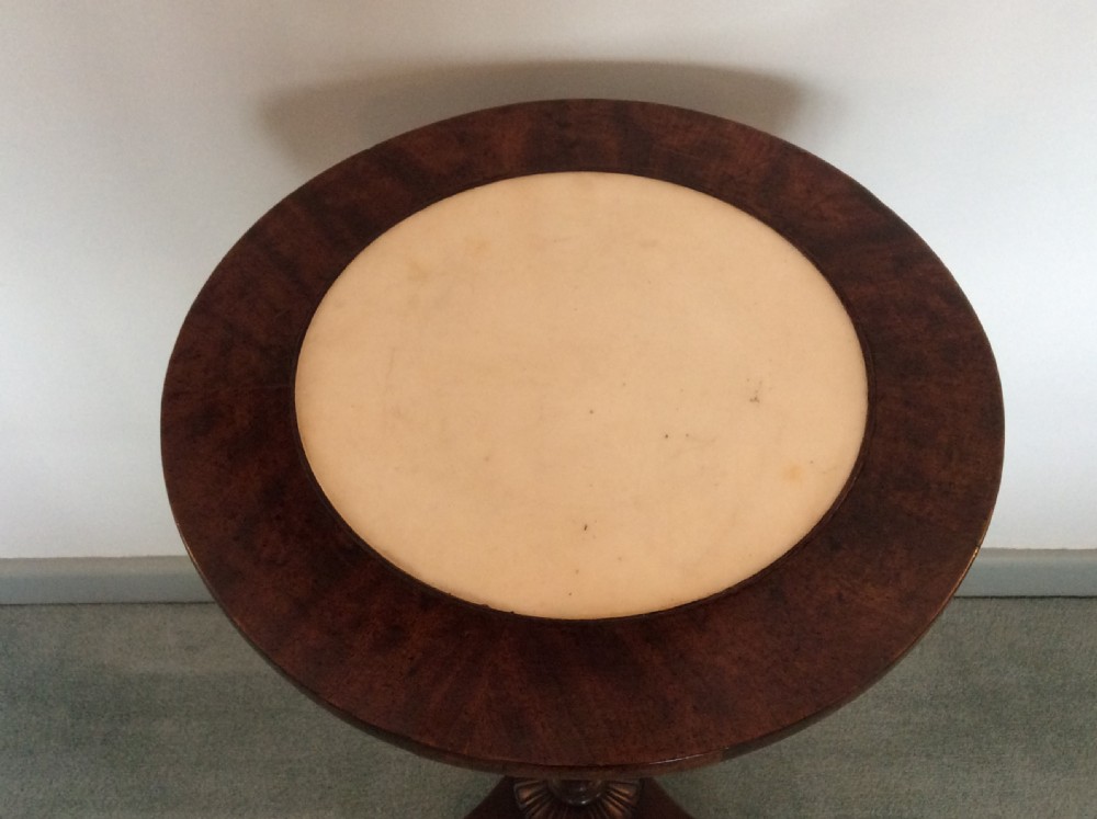 A Regency mahogany occasional table View VI