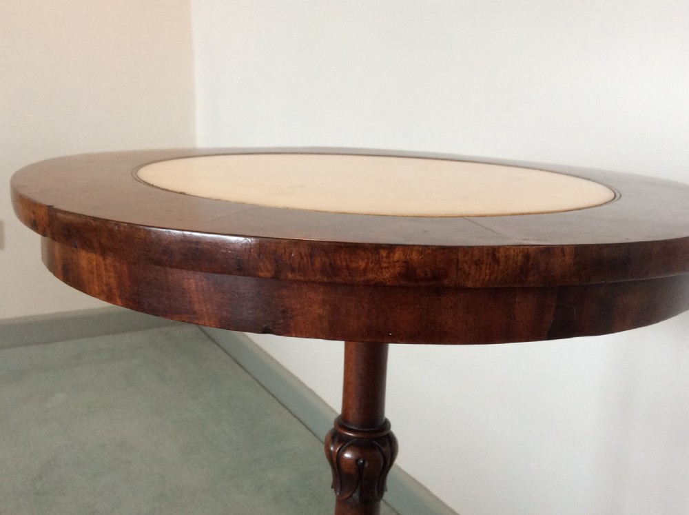 A Regency mahogany occasional table View IX