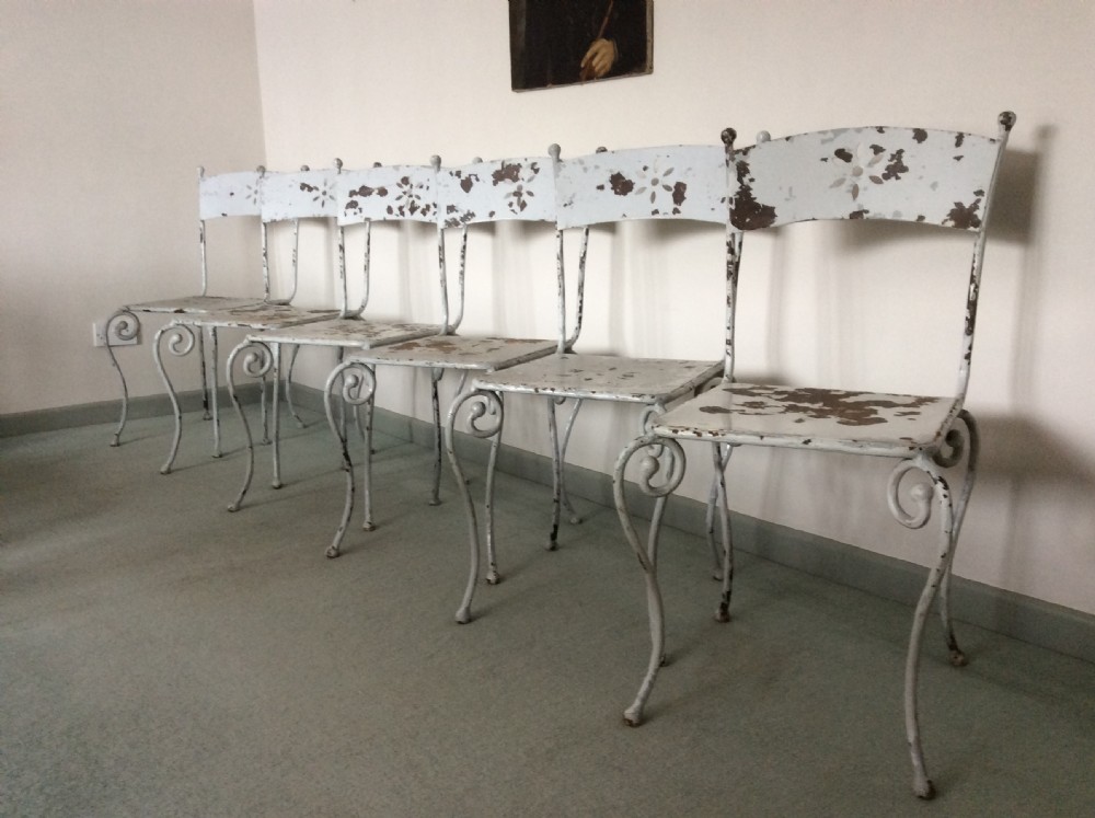 Six French iron garden dining chairs