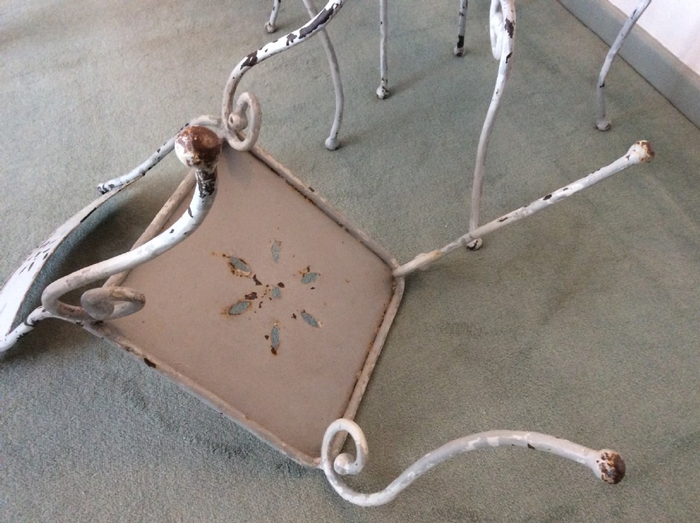 Six French iron garden dining chairs View X