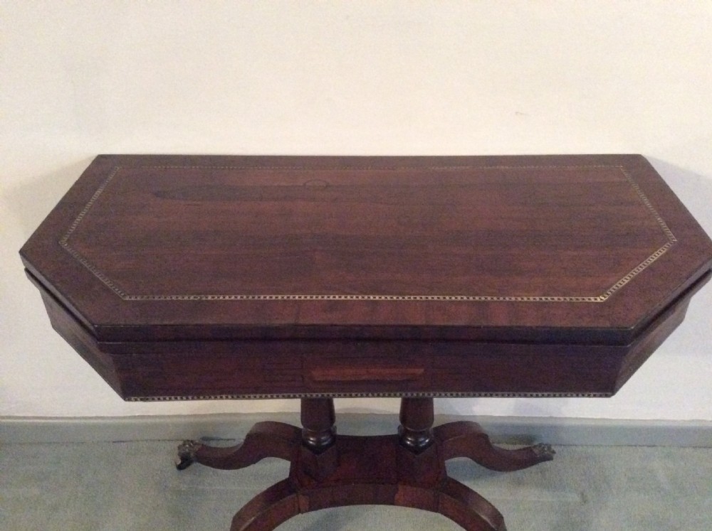 A Regency rosewood brass inlaid hall table View III