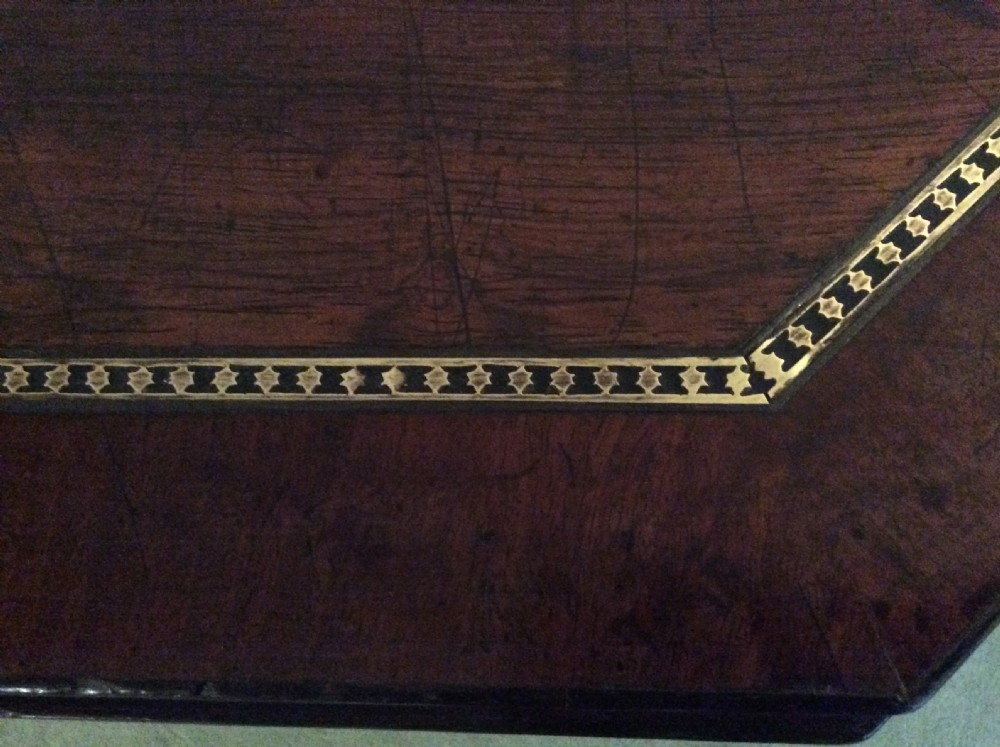 A Regency rosewood brass inlaid hall table View IV