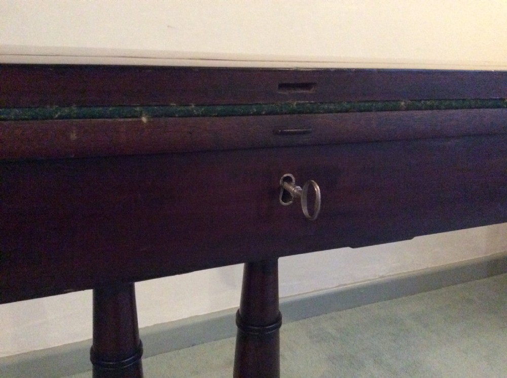 A Regency rosewood brass inlaid hall table View VIII