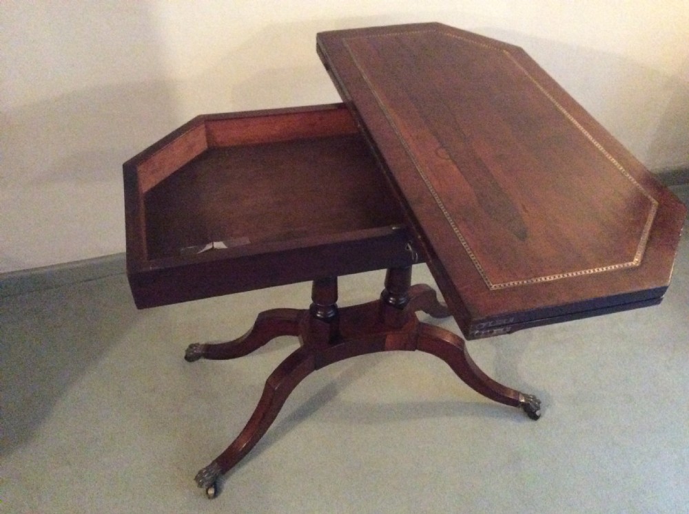 A Regency rosewood brass inlaid hall table View IX